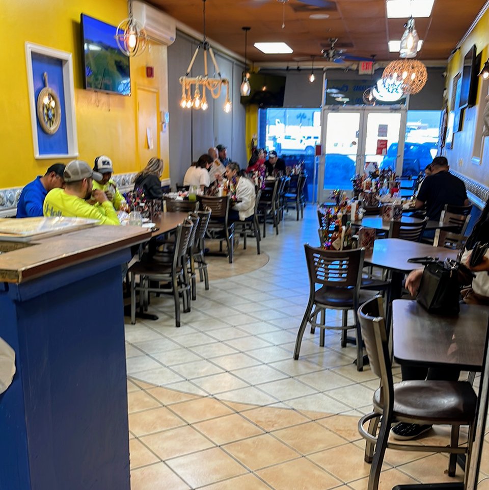 Counter service inside a casual seafood restaurant.